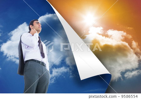 Composite image of unsmiling businessman standing 9586554