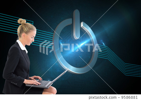 Composite image of businesswoman using laptop 9586881