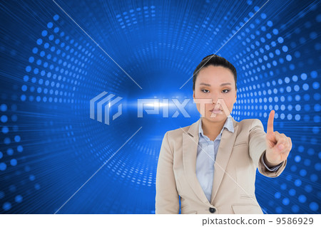 Composite image of unsmiling asian businesswoman pointing Composite image of unsmiling asian businesswoman pointing 9586929