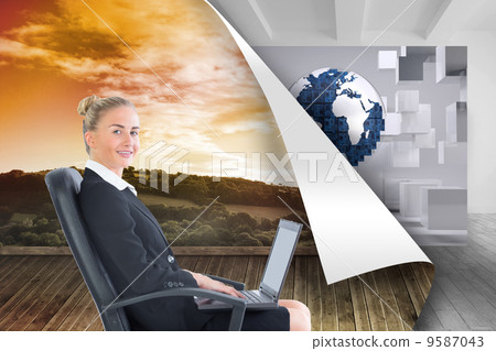 Composite image of businesswoman sitting on swivel chair with la Composite image of businesswoman sitting on swivel chair with la 9587043