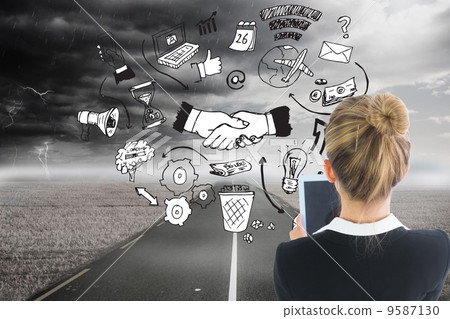 Composite image of businesswoman holding new tablet Composite image of businesswoman holding new tablet 9587130