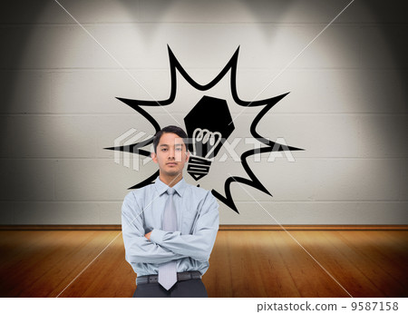 Composite image of serious asian businessman 9587158