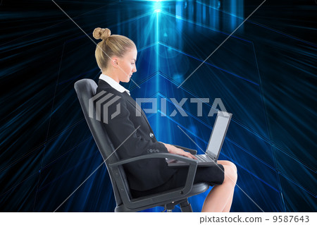 Composite image of businesswoman sitting on swivel chair with la 9587643