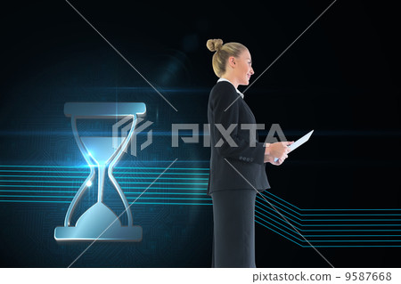 Composite image of businesswoman holding new tablet Composite image of businesswoman holding new tablet 9587668