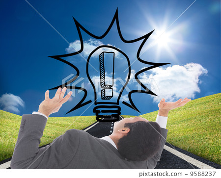 Composite image of businessman with arms raised 9588237