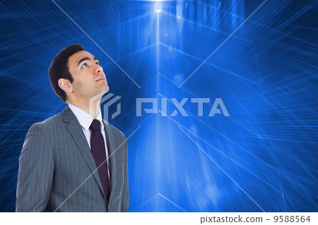 Composite image of unsmiling businessman standing Composite image of unsmiling businessman standing 9588564