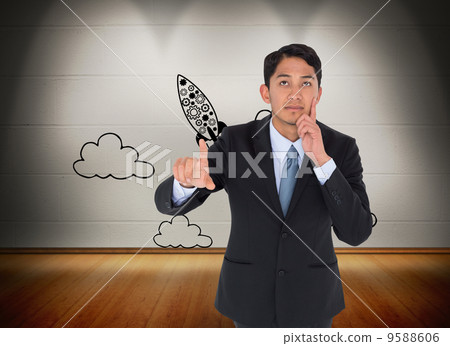 Composite image of thoughtful asian businessman pointing Composite image of thoughtful asian businessman pointing 9588606