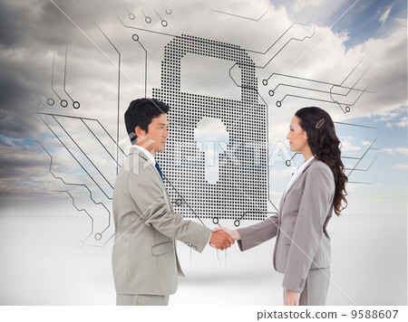 Composite image of side view of hand shaking trading partners Composite image of side view of hand shaking trading partners 9588607