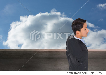 Composite image of serious asian businessman Composite image of serious asian businessman 9588759