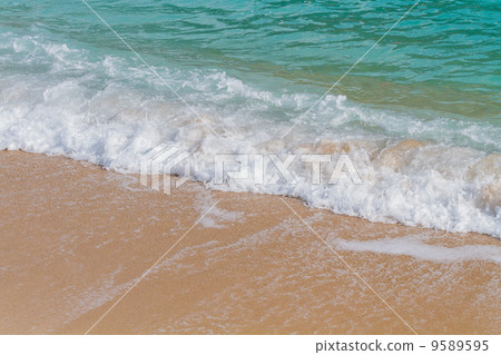 Wave of the sea on the sand beach 9589595