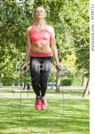 Strained blonde woman skipping 9589713