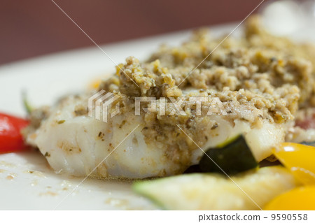 Close up of delicious fish dish with pesto 9590558