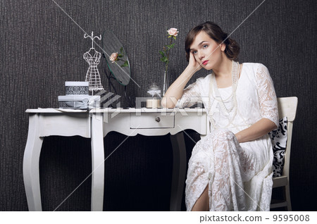 Beautiful girl on dark background 9595008