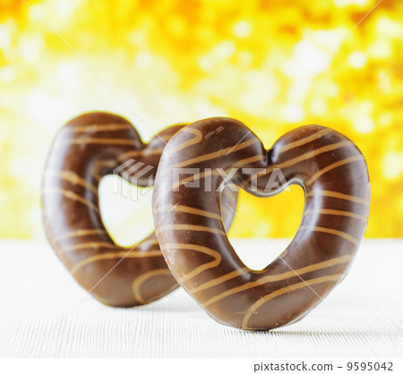 Chocolate hearts on nature backgroud 9595042