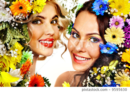Woman with make up and flower. 9595630