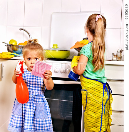 Children cleaning kitchen. Children cleaning kitchen. 9595689
