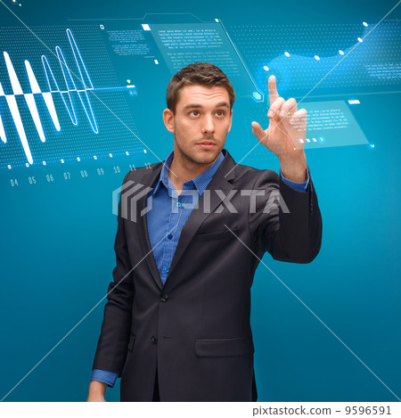 businessman working with imaginary virtual screen businessman working with imaginary virtual screen 9596591