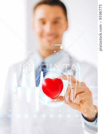 male doctor with heart and cardiogram male doctor with heart and cardiogram 9596775