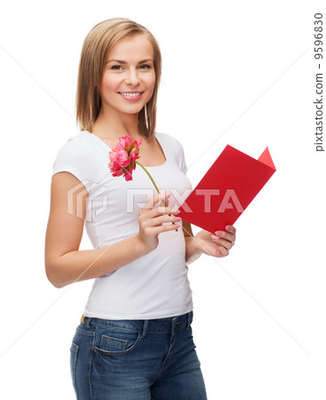 smiling girl with postcard and flower smiling girl with postcard and flower 9596830