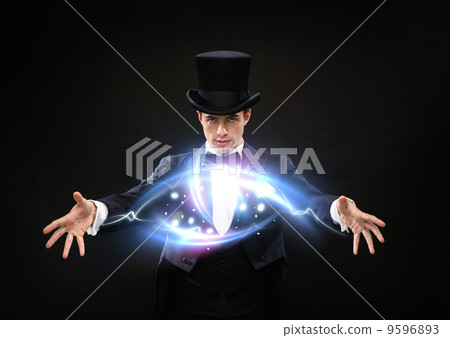 magician in top hat showing trick magician in top hat showing trick 9596893