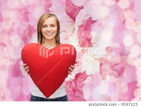 smiling woman in white t-shirt with heart 9597225