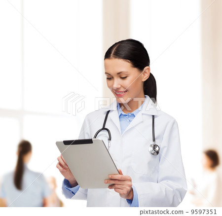 female doctor with stethoscope and tablet pc female doctor with stethoscope and tablet pc 9597351