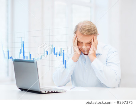 stressed old man filling a form at home 9597375