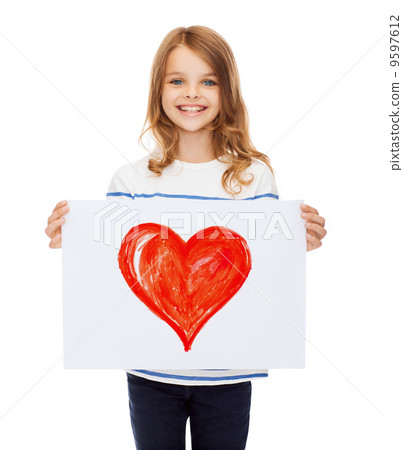 smiling little child holding picture of heart 9597612