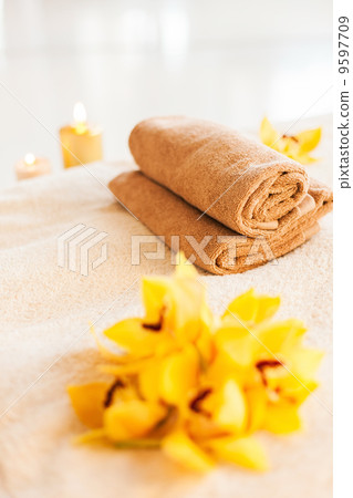 closeup of vase, flowers and oil 9597709