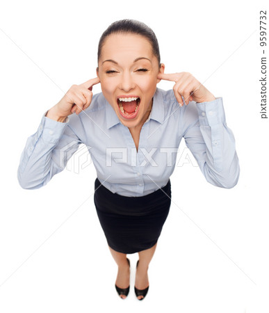 businesswoman screaming with closed ears 9597732