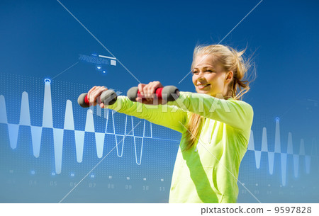 sporty woman with light dumbbells outdoors sporty woman with light dumbbells outdoors 9597828