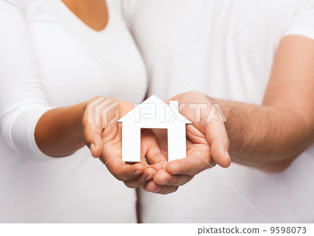 couple hands with paper house couple hands with paper house 9598073