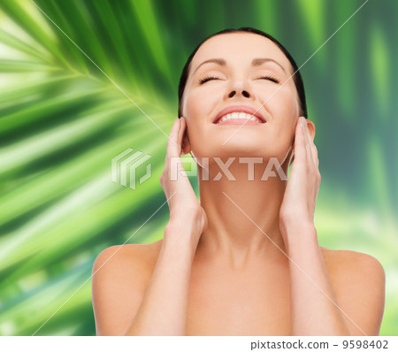 face of young smiling woman 9598402