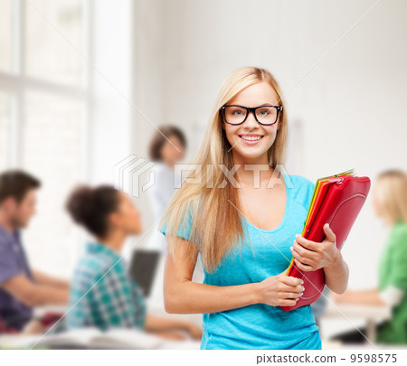 smiling student with folders in eyeglasses 9598575