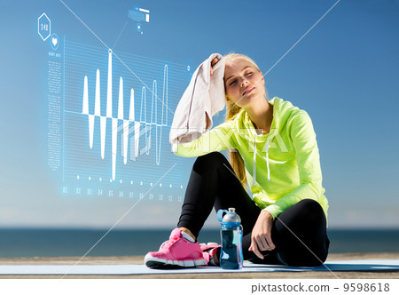 woman resting after doing sports outdoors woman resting after doing sports outdoors 9598618
