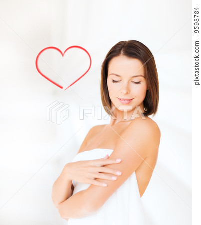 beautiful woman standing in towel beautiful woman standing in towel 9598784