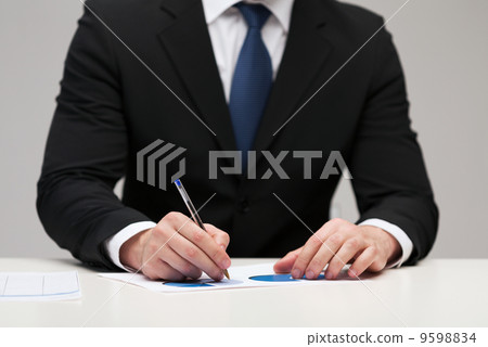 close up of businessman with papers 9598834