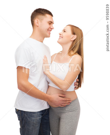happy young family expecting child 9598839