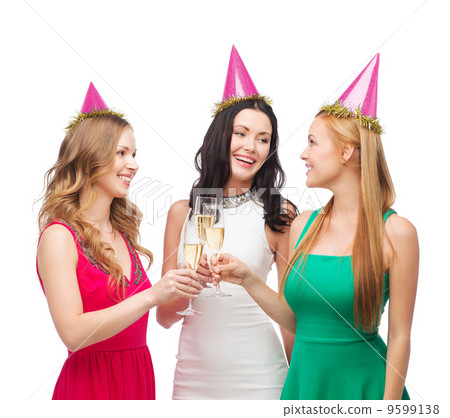 three women in pink hats with champagne glasses 9599138
