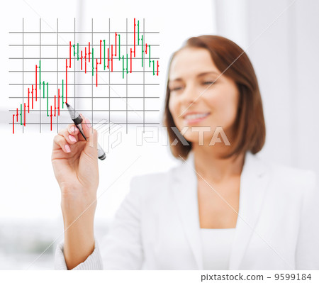 businesswoman drawing forex chart in the air 9599184