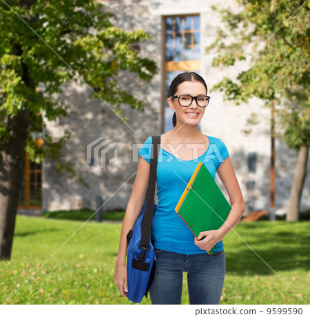 smiling student with bag and folders smiling student with bag and folders 9599590