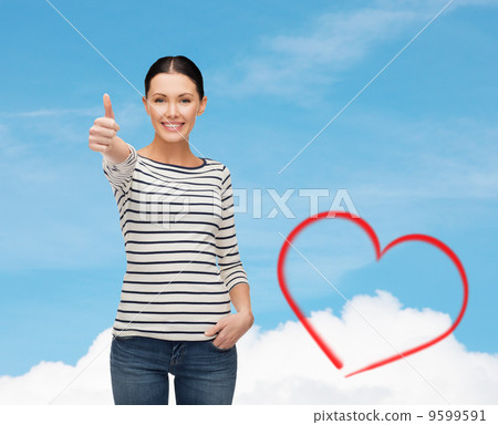 smiling girl in casual clother showing thumbs up smiling girl in casual clother showing thumbs up 9599591