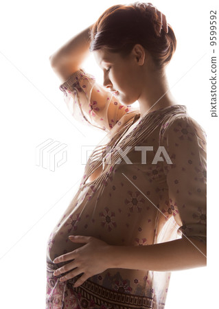 silhouette picture of pregnant beautiful woman silhouette picture of pregnant beautiful woman 9599592