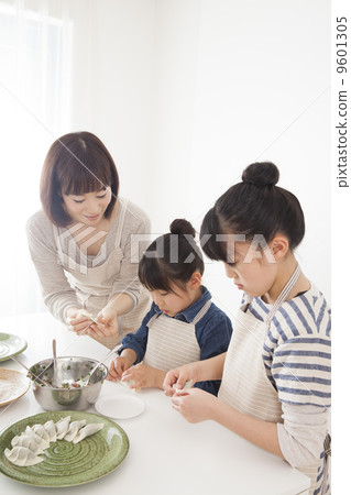 Parents making dumplings Parents making dumplings 9601305