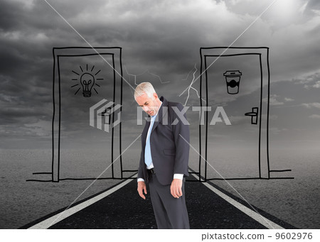 Composite image of businessman hanging 9602976