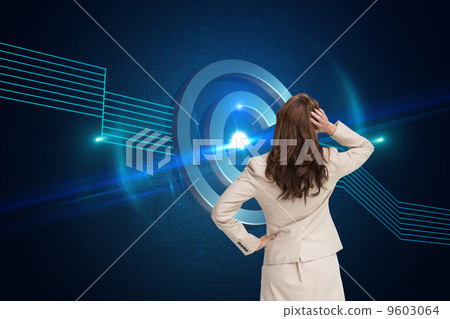 Composite image of businesswoman standing back to camera with ha 9603064