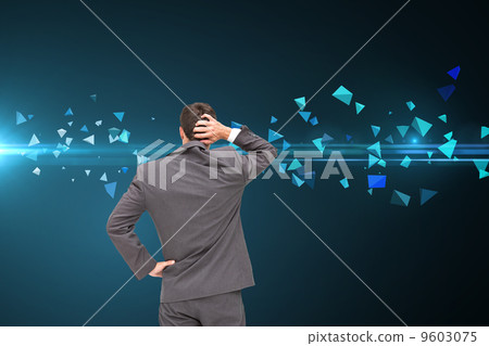Composite image of young businessman standing back to camera scr Composite image of young businessman standing back to camera scr 9603075