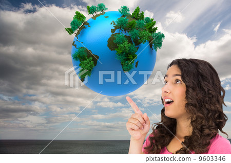 Composite image of surprised brown haired woman pointing out 9603346