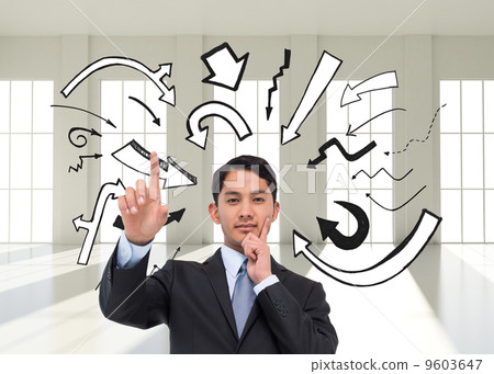 Composite image of thoughtful asian businessman pointing Composite image of thoughtful asian businessman pointing 9603647