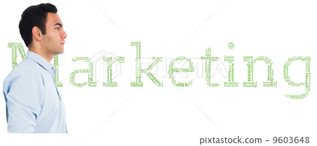 Composite image of unsmiling casual man standing 9603648